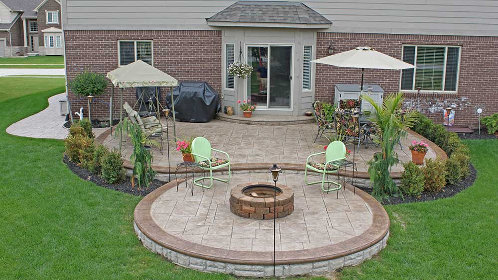 Stamped patio with fire pit in Oakland Township, Michigan