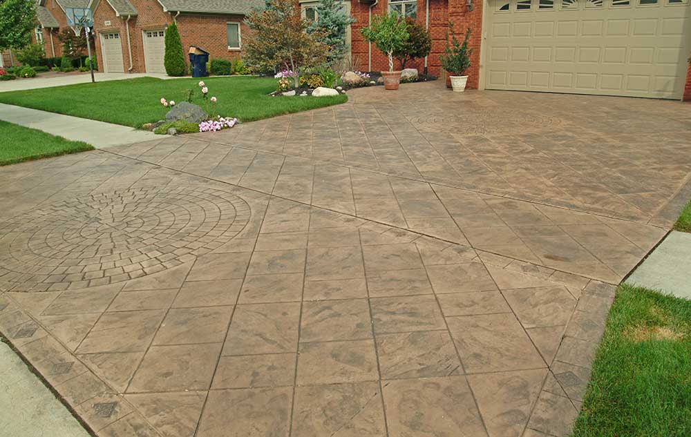 Shelby Township Stamped Concrete Driveway Contractor with Decorative Accent
